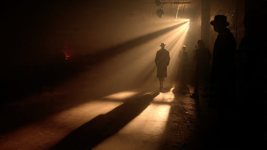 A dramatic shot showcasing the interplay of light and shadow in a film scene