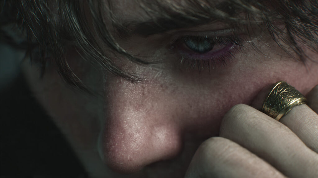 Close-up of a character's emotional expression in Rings of Power