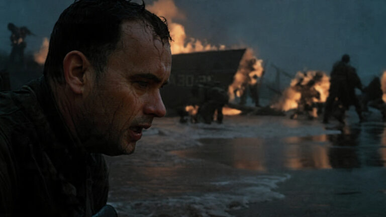 Captain Miller (Tom Hanks) looking weary amidst the chaos of war