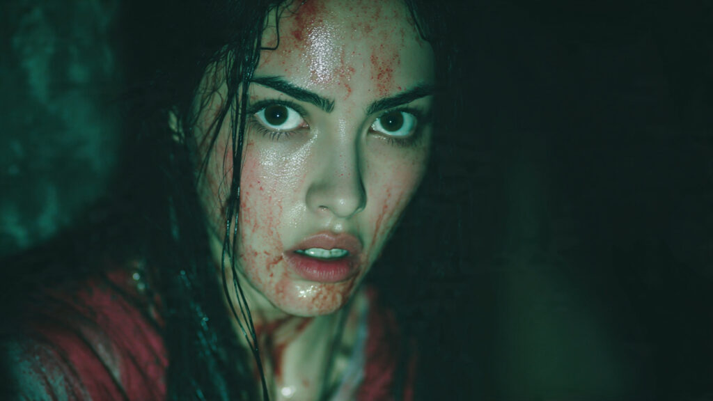 Davika Hoorne in a dramatic horror pose