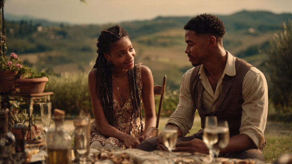 Halle Bailey and Regé-Jean Page Spark in Predictable Yet Utterly Charming Italian Rom-Com 2 Halle Bailey and Regé-Jean Page sharing a romantic moment in an Italian vineyard.