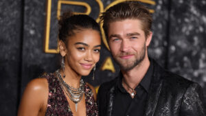 Close-up shot of Zendaya and Robert Pattinson looking intensely at each other